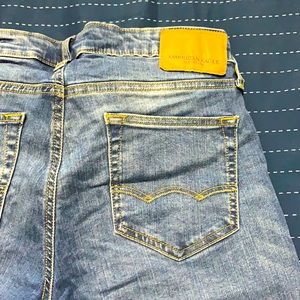 Used maybe twice. Med Wash American Eagle Jeans